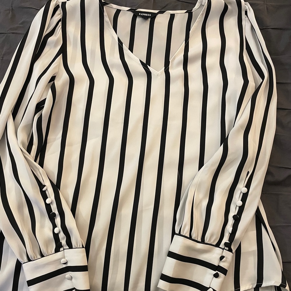 Black and white striped blouse.